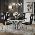 Elegancka jadalnia ze stołem okrągłym Davson i krzesłami z kolekcji Luxury w czarnej tapicerce - BellaCasa.co.jpg
