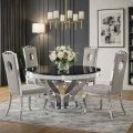 Elegancka jadalnia ze stołem okrągłym Davson i krzesłami z kolekcji Luxury w szarej tapicerce - BellaCasa.co.jpg